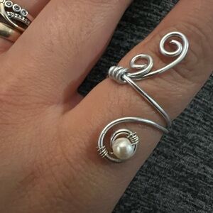 Elegant Silver Swirl Ring with Pearl Accent